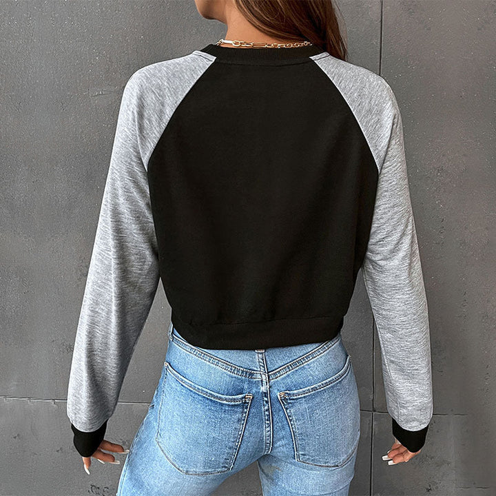 Women's short cut raglan sweatshirt with thumb hole cuffs and elastic hem Mune Fashion