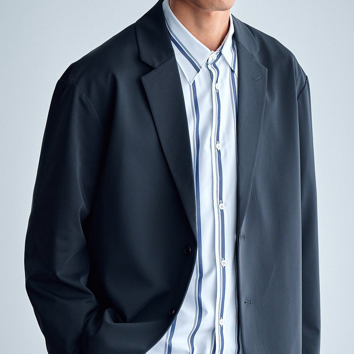 Men's oversized blazer made from technical stretch fabric with single-button closure Mune Fashion