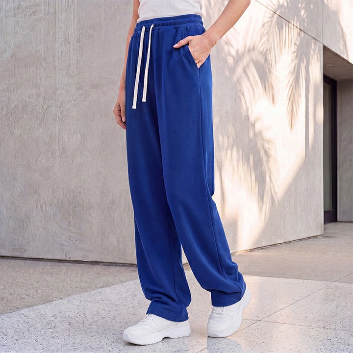 Women's wide lounge palazzo pants with high comfort waistband, drawstring, side pockets, and decorative side seam Mune Fashion