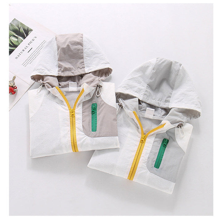 Women's lightweight hooded color block outdoor jacket with mesh lining and multiple zippered pockets Mune Fashion