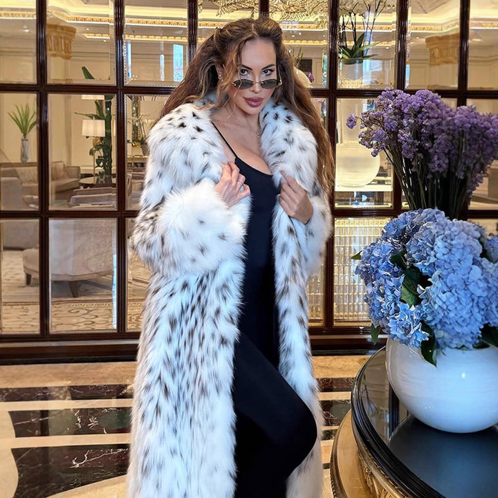 Women's luxurious long plush faux fur coat with opulent fur collar and speckled design Mune Fashion