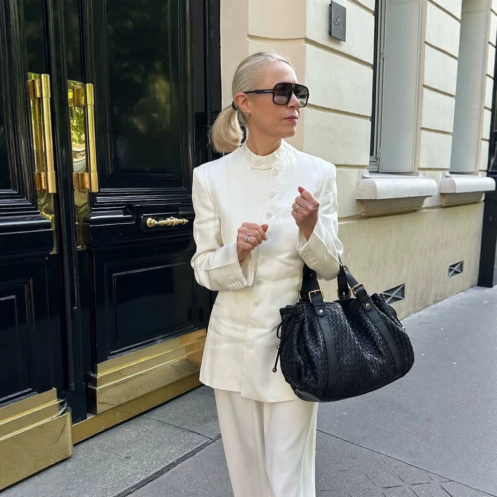 Women's tailored long blazer with a stand collar, boxy shoulder, and concealed button placket Mune Fashion