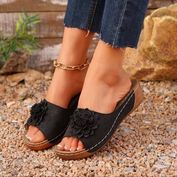 Women's Perforated Wedge Sandals as Slip-On with Flower Application and Padded Footbed Mune Fashion