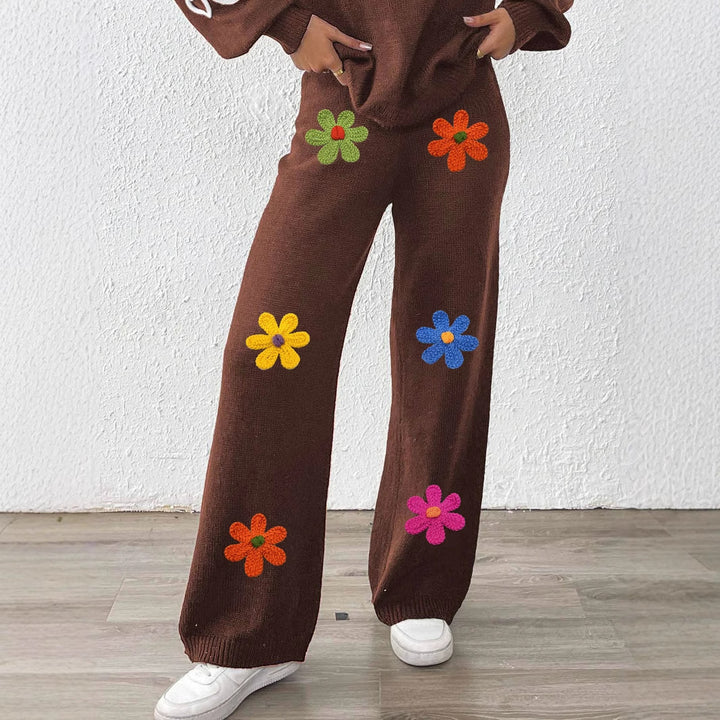 Women's casual knit pants with colorful floral appliqués Mune Fashion