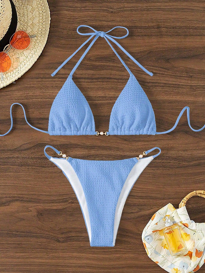 Women's Triangle Bikini with fashionable lacing details and elegant accents Mune Fashion