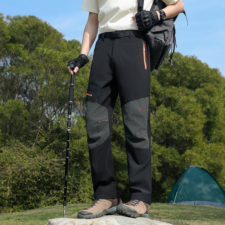 Men's water-repellent softshell trekking pants with reinforced knee flex zones and concealed zipper pockets Mune Fashion