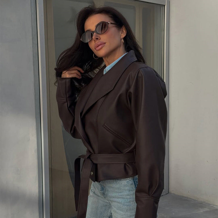 Women’s short blazer made of vegan leather with waist belt Mune Fashion