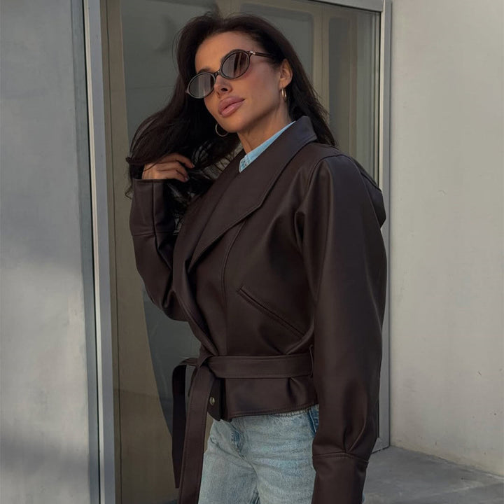 Women’s short blazer made of vegan leather with waist belt Mune Fashion