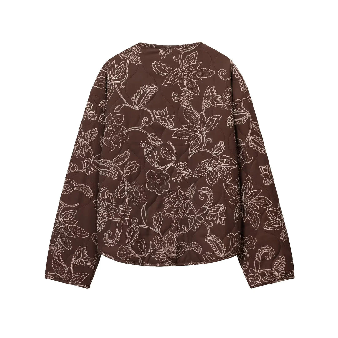 Women's padded short jacket with floral quilting pattern, snap button front and waist drawstring Mune Fashion