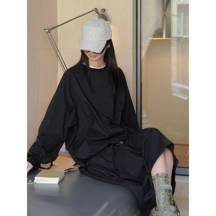 Women's Oversize Rain and Wind Pullover with Water-Repellent Surface and Elastic Hem Mune Fashion