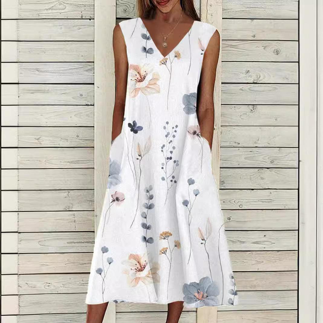Women's maxi dress with separate bolero, V-neck, inset pockets, and floral A-line silhouette Mune Fashion