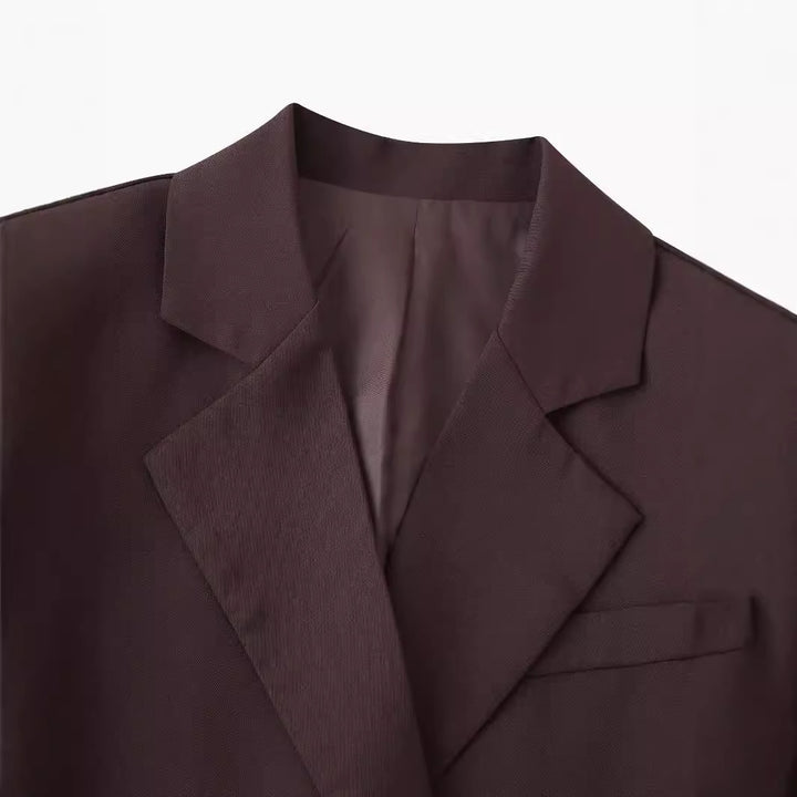 Women's oversized long blazer with boxy cut, lapel collar, and hidden chest pocket Mune Fashion