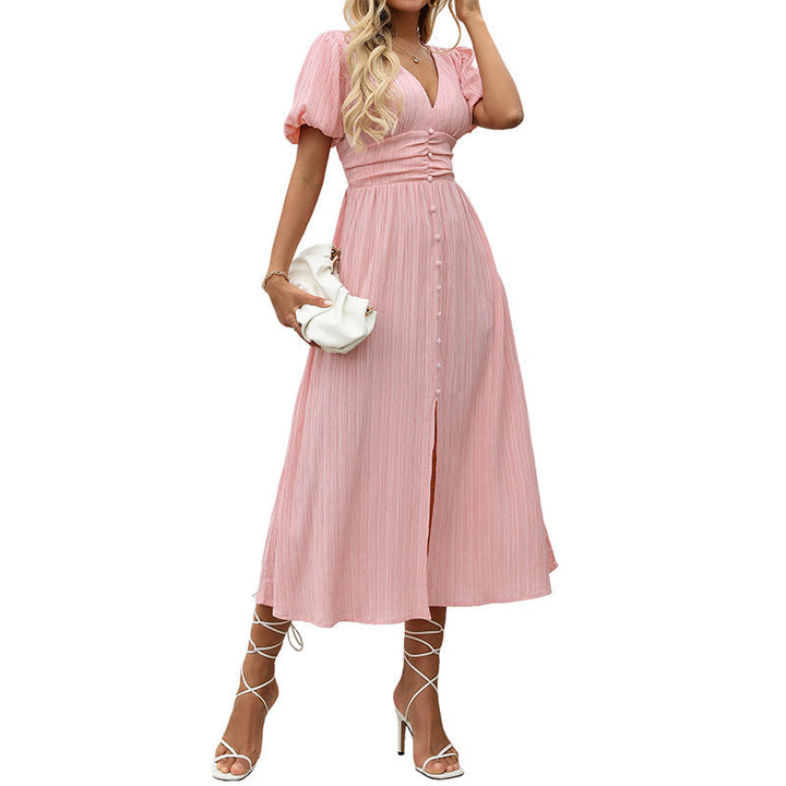 Ladies figure-flattering midi dress with ribbed texture, puff sleeves, and V-neck Mune Fashion