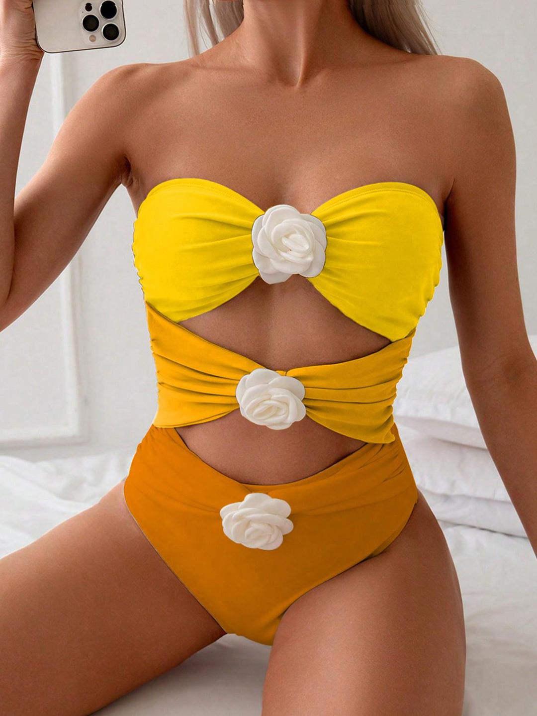 Women's bandeau swimsuit with elegant ruffles and floral accents Mune Fashion
