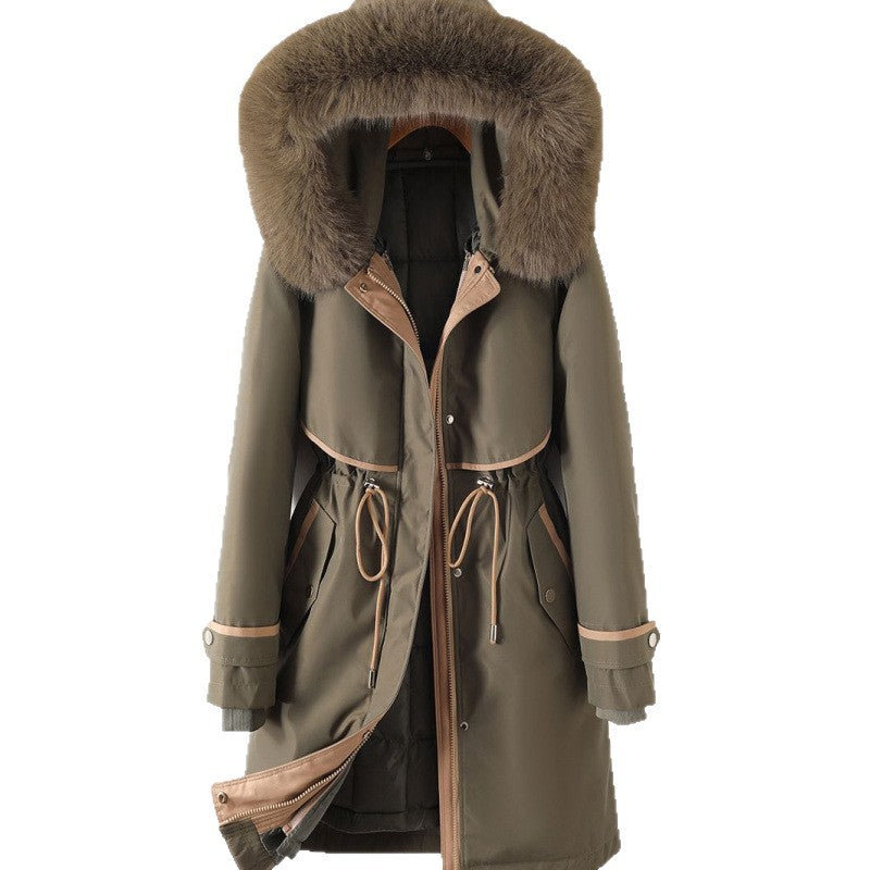 Women's long parka with faux fur hood, waist drawstring, and contrasting piping Mune Fashion