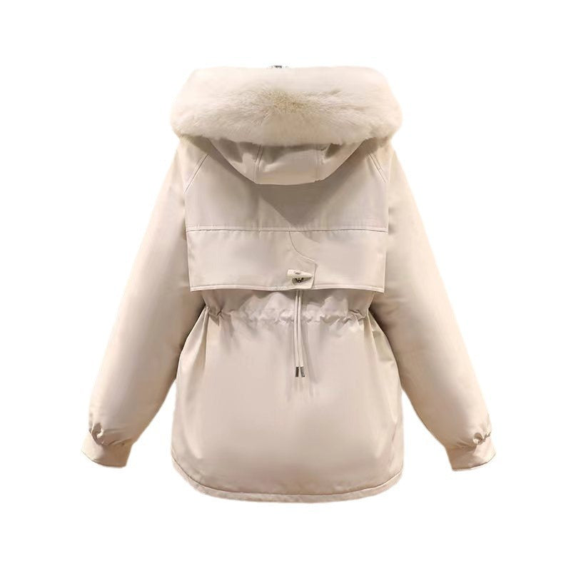 Ladies nano thermo parka with hood, voluminous faux fur collar, drawstring waist and multifunctional pockets Mune Fashion