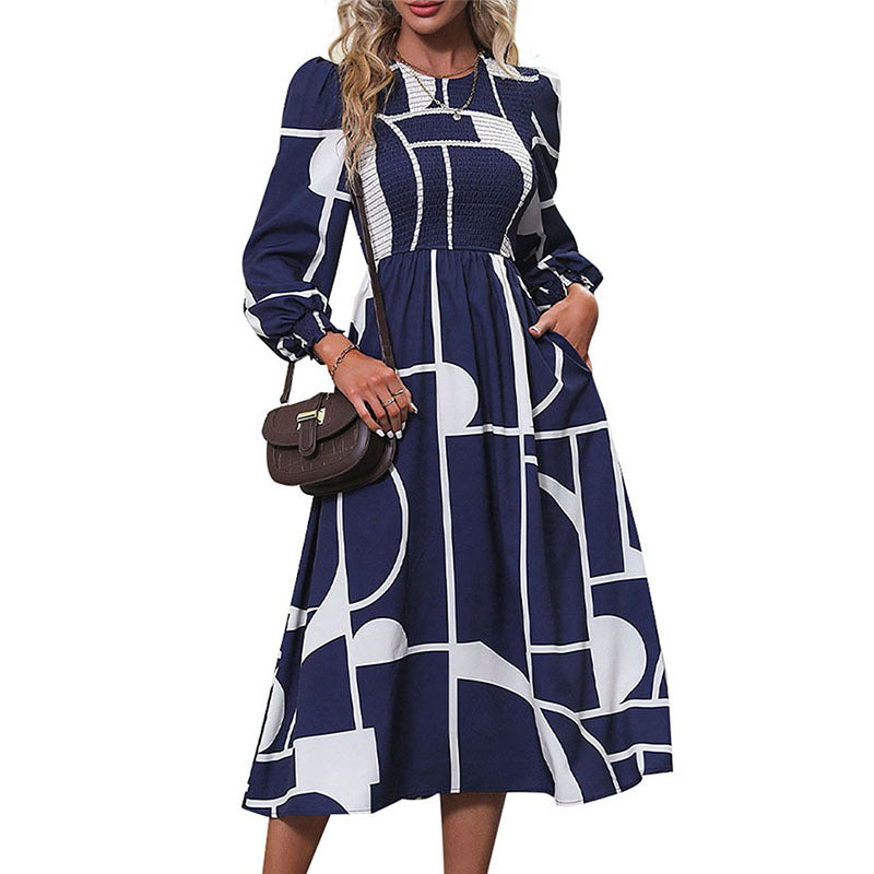 Women's A-line midi dress with smocked bustier, long balloon sleeves, and graphic print Mune Fashion