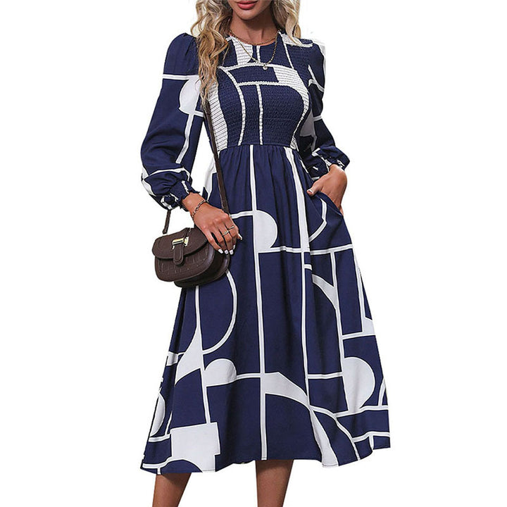Women's A-line midi dress with smocked bustier, long balloon sleeves, and graphic print Mune Fashion