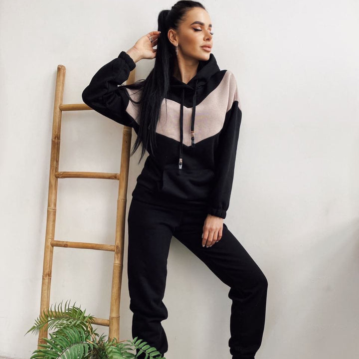Women's two-piece loungewear set with chevron hoodie and fitted tapered joggers Mune Fashion
