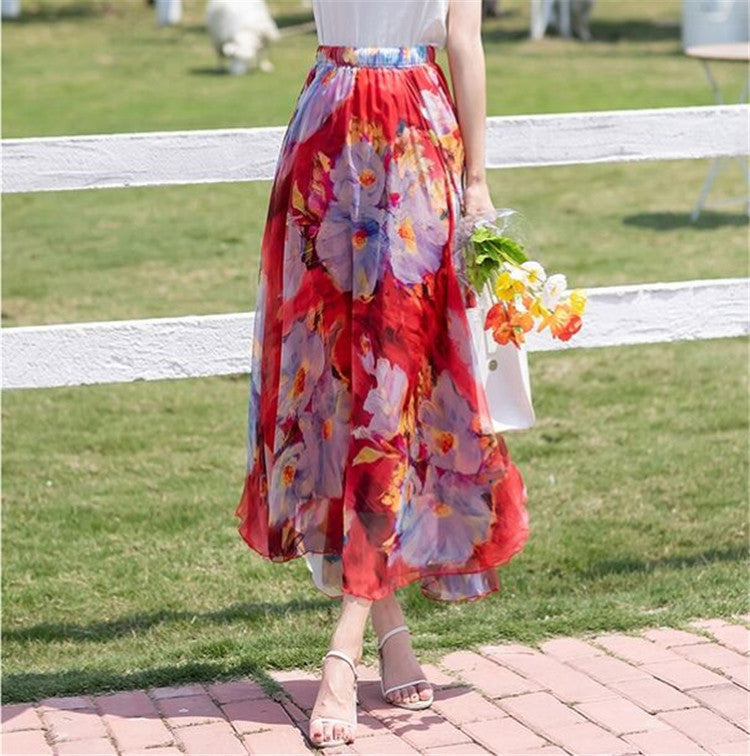 Women long pleated maxi skirt with floral summer print and elastic waistband Mune Fashion