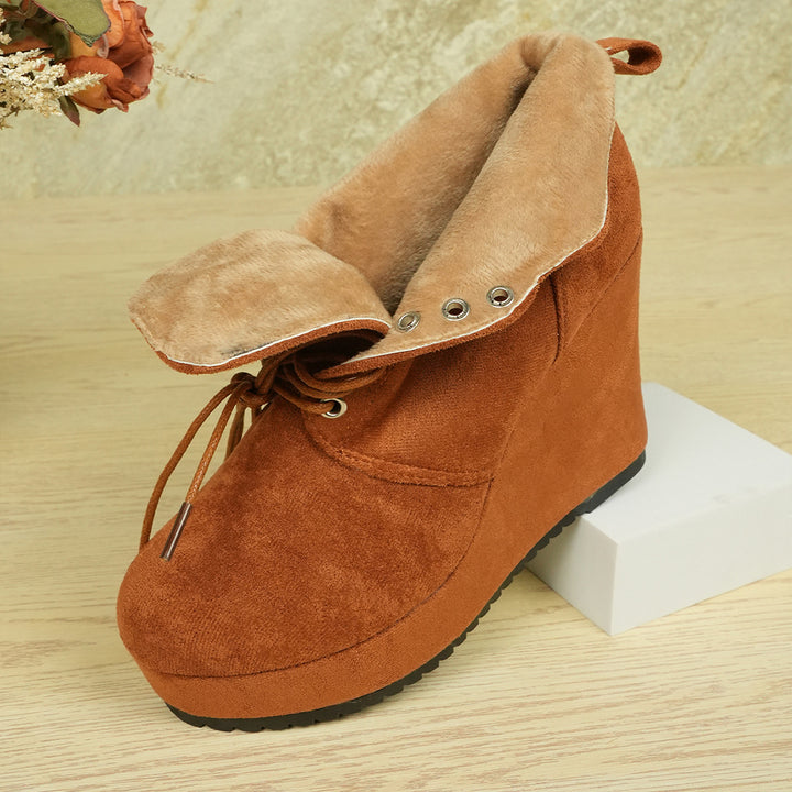 Women's faux fur lined wedge ankle boots with foldable fur collar, lacing and slip-resistant tread sole Mune Fashion
