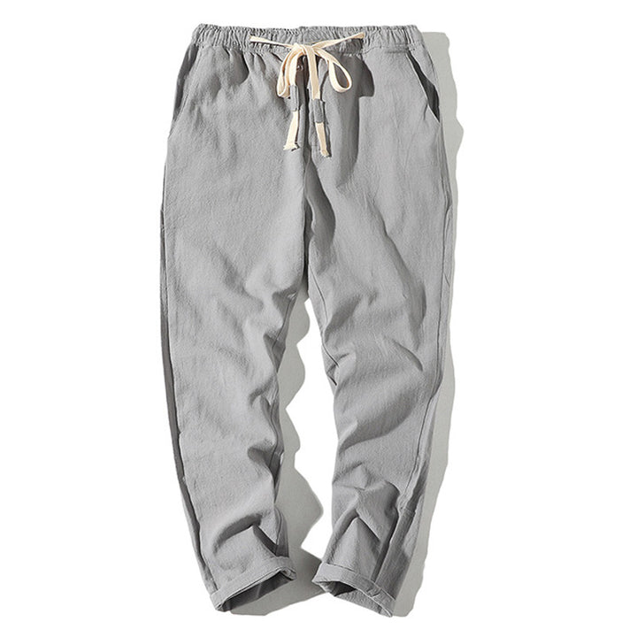 Men's lightweight linen trousers with elastic waistband and drawstring, tapered fit and roll-up hem Mune Fashion