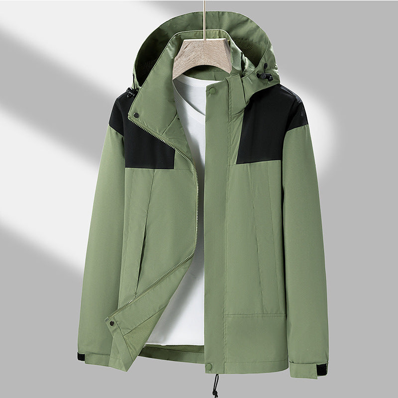 Men's lightweight softshell jacket with contrasting shoulder panel, adjustable hood, and Velcro cuffs Mune Fashion