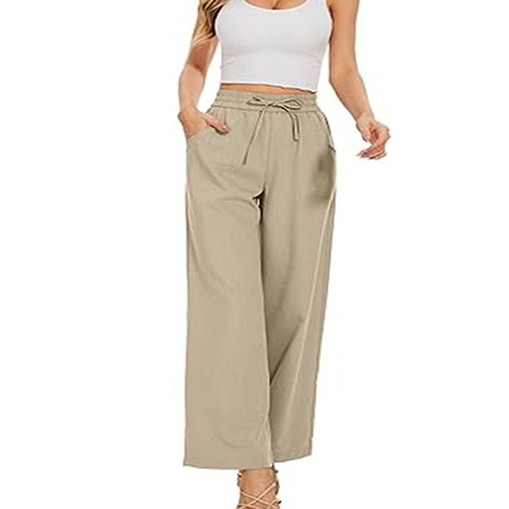 Women's wide linen pants with high elastic waistband, drawstring, and side pockets Mune Fashion