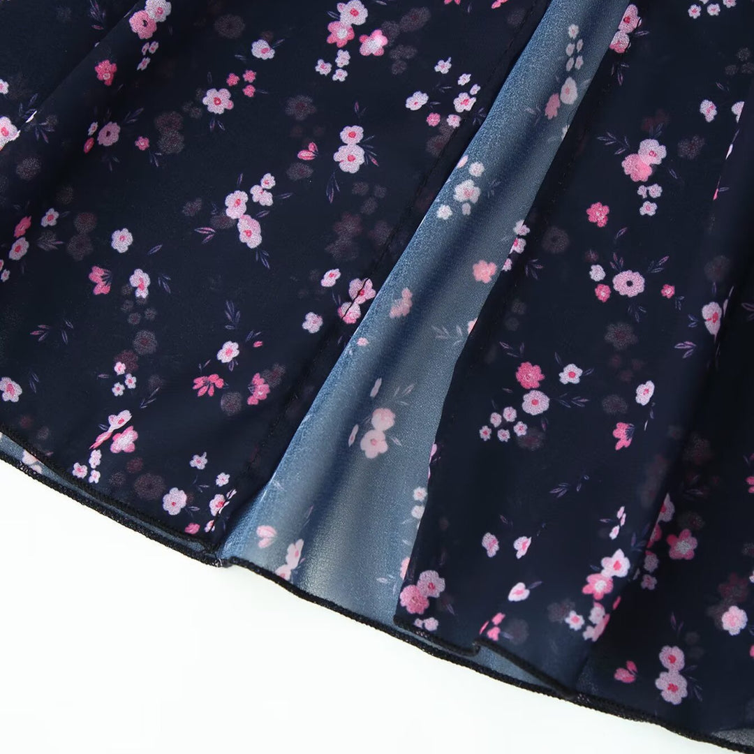 Women’s maxi dress with ruffles, V-neck and floral chiffon look Mune Fashion
