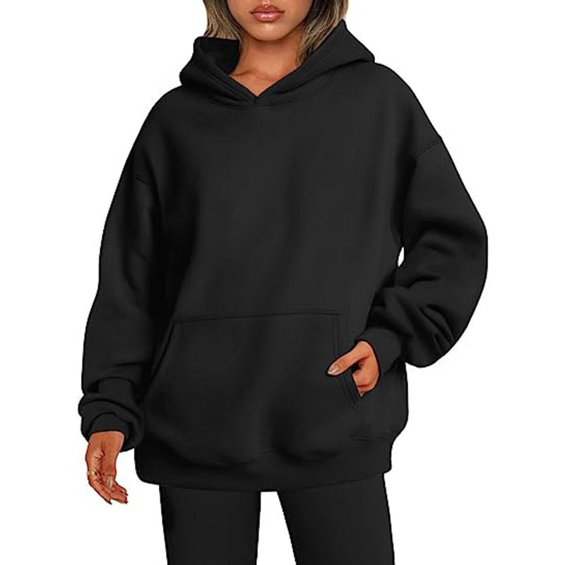 Women's oversized hooded sweatshirt made of soft cotton blend with kangaroo pocket Mune Fashion