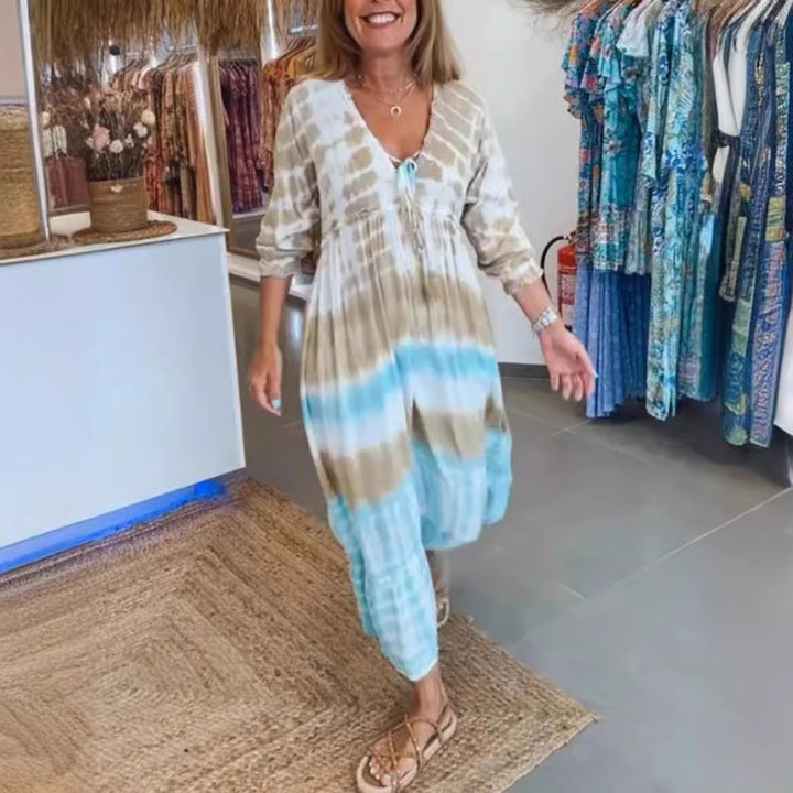 Women's airy batik tiered dress with V-neck, empire waist, and elastic sleeves Mune Fashion