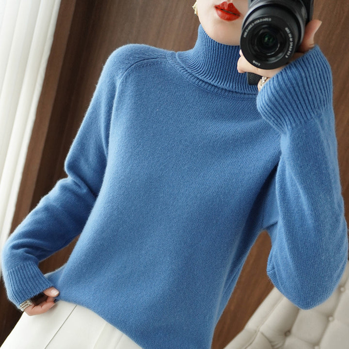 Women's turtleneck sweater made of soft wool blend with extended cuffs Mune Fashion
