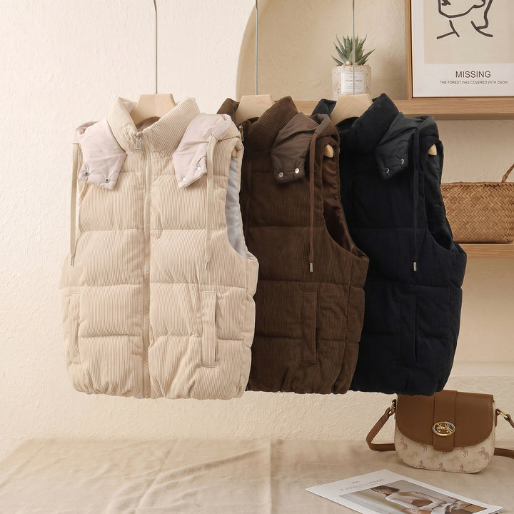 Ladies quilted cord vest with high shawl collar, padded insulation and detachable hood trim Mune Fashion