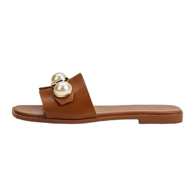 Ladies' flat slide sandal with large decorative pearls and gold-trimmed applications padded comfort footbed Mune Fashion