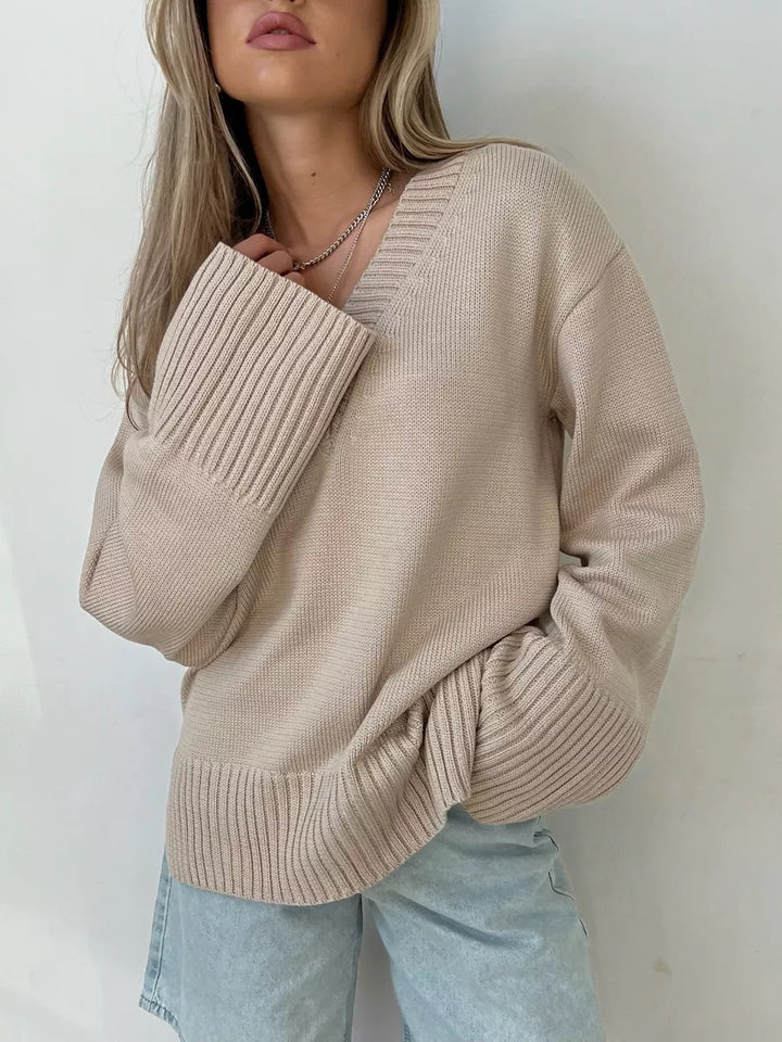 Women’s oversized fine knit sweater with deep V-neckline, ribbed cuffs and loose silhouette Mune Fashion