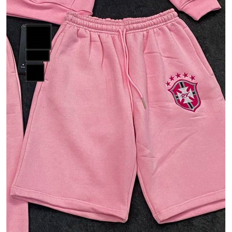 Women's loose jogging pants with elastic waistband, drawstring, and embroidered emblem Mune Fashion