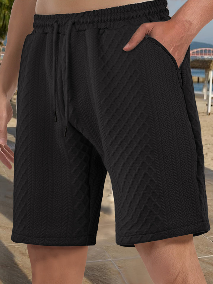 Men's textured beach bermuda shorts made of waffle jersey with elastic drawstring waistband and slanted pockets Mune Fashion