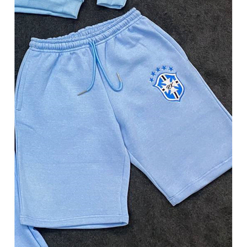 Women's loose jogging pants with elastic waistband, drawstring, and embroidered emblem Mune Fashion