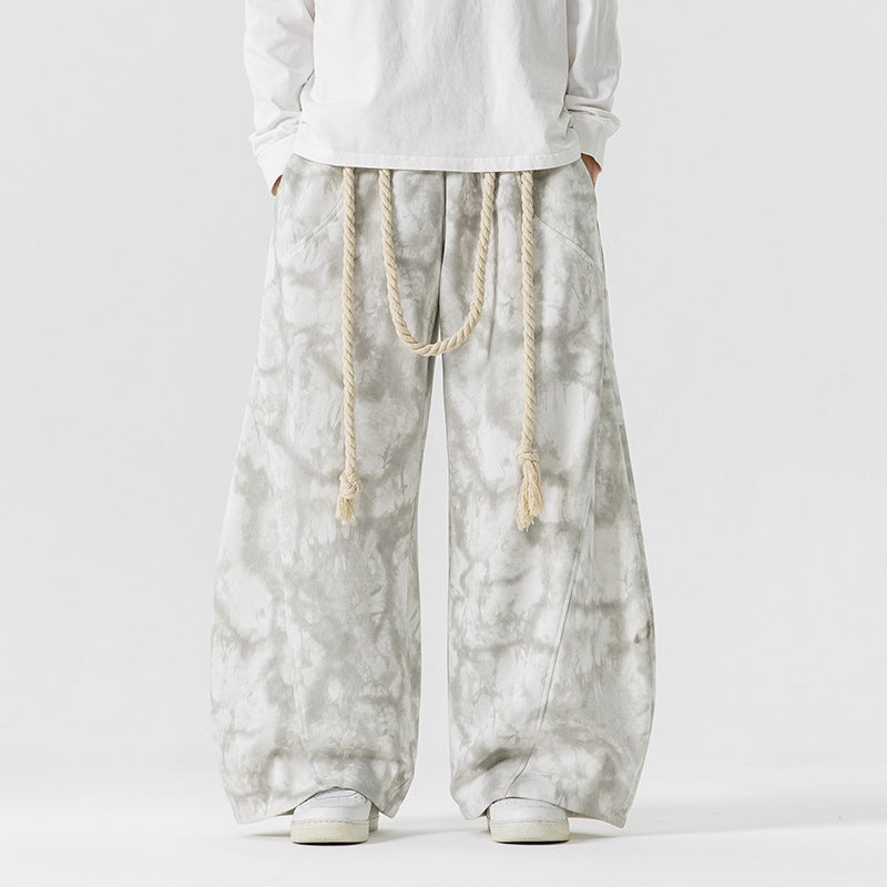 Unisex wide batik harem pants with decorative drawstring and deep crotch Mune Fashion
