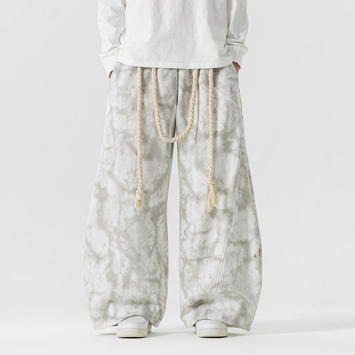 Unisex wide batik harem pants with decorative drawstring and deep crotch Mune Fashion