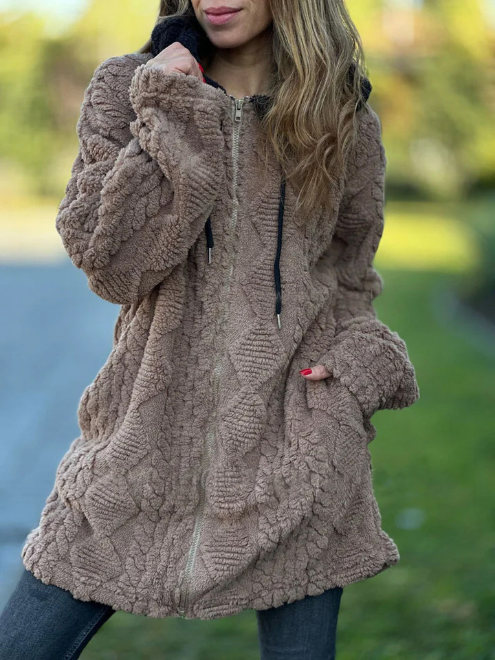 Women's oversized teddy coat jacket with contrasting hood, zipper, and side pockets Mune Fashion