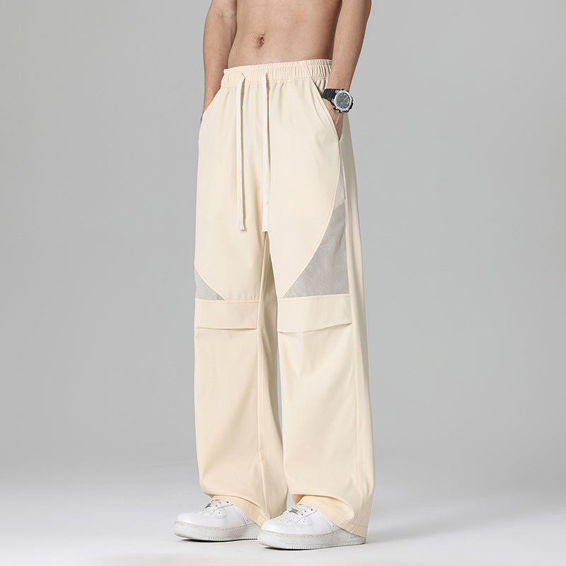 Men's Loose-Fitting Sports Pants with Breathable Mesh Inserts