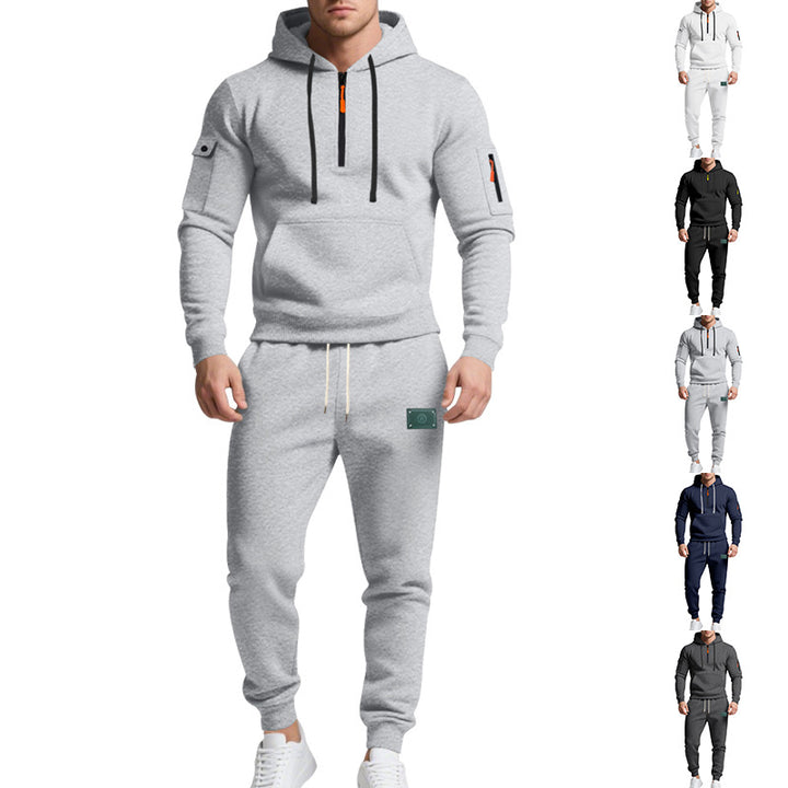Men's half-zip hoodie and tapered jogger set with kangaroo pocket, zipper details, and elastic drawstring waistband Mune Fashion