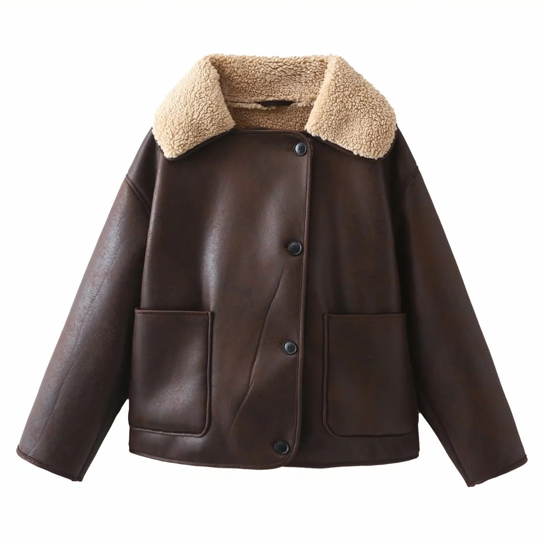 Women's trendy faux leather shearling jacket with large teddy collar, patch front pockets, and button closure Mune Fashion