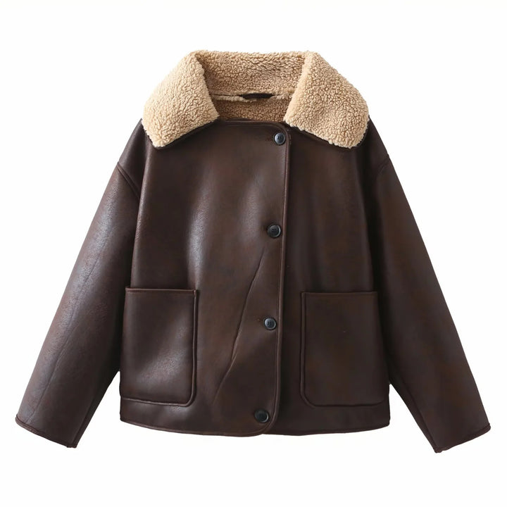 Women's trendy faux leather shearling jacket with large teddy collar, patch front pockets, and button closure Mune Fashion