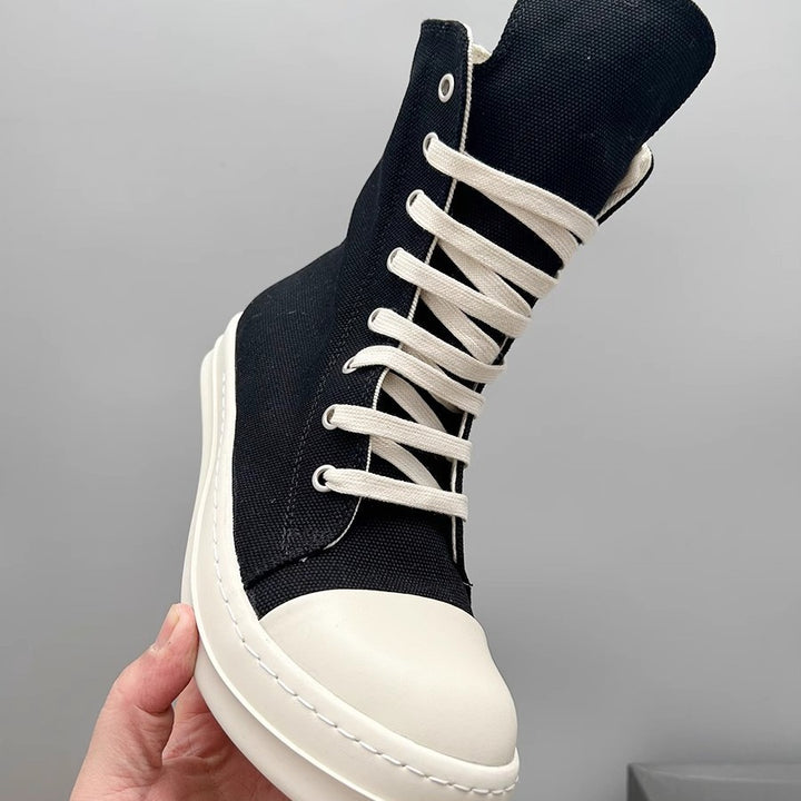 Women’s platform boots with elevated rubber platform, high shaft and reinforced toe cap Mune Fashion