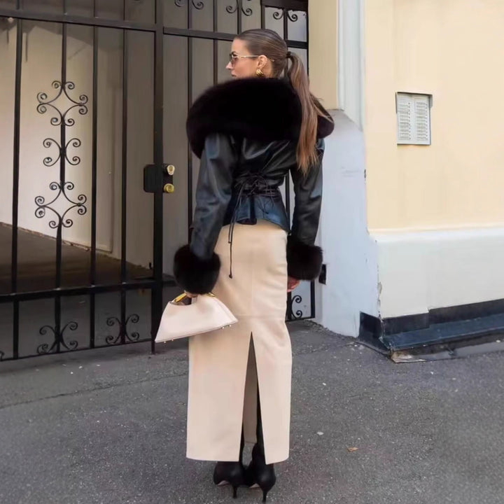 Women's short jacket made of synthetic leather with voluminous faux fur collar and fur cuffs Mune Fashion