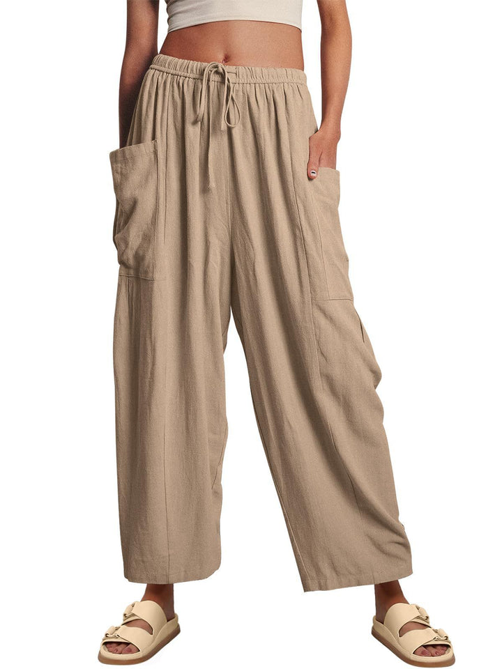 Women's wide palazzo pants made from a lightweight linen blend with drawstring and side pocket Mune Fashion