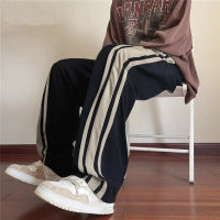 Men's loose training pants with elastic drawstring waistband, side contrast stripe & relaxed baggy fit Mune Fashion