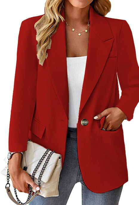 Ladies longline blazer in oversized style with a striking lapel, metal button, and patch pockets Mune Fashion